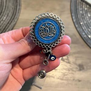 Lotus Badge Reel